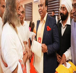 ACOHI Chairman Dr. Sanee Awasrmmel with His Holiness Sri Sri Ravishankar Ji.